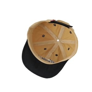 Inside view of two-tone fantasy embroidery baseball cap with soft brim and snapback