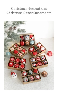 Detail of wool felt Christmas tree ornaments with embroidery in a gift box