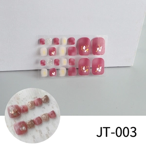 Close-up of 3D toe nail stickers with burgundy floral patterns and gold foil details