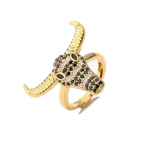 Adjustable gold bull head ring with black and white zircon pave and spiral textured horns