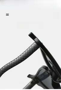 Detail of black sunglasses temple with intricate fish scale texture and glossy finish