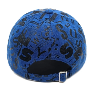 Detail view of the blue suede baseball cap with graffiti letters and metal buckle back