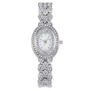 Elegant silver quartz watch with diamond-set oval dial and rhinestone bracelet band