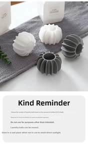Detailed view of gray and white silicone laundry balls with anti-tangling ridges