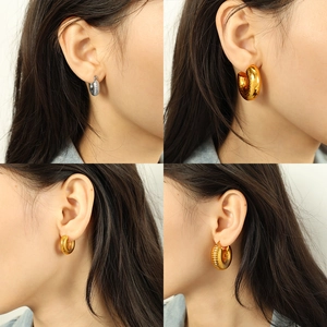 Chunky gold and silver plated stainless steel croissant hoop earrings for women in four sizes