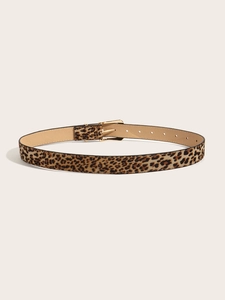 Detail of leopard print faux fur belt featuring a gold metal pin buckle and textured finish