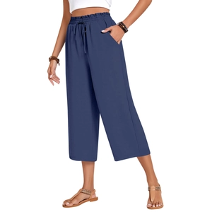Detailed view of women's linen wide-leg pants featuring elastic drawstring waist and side pockets