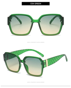 Detail view of square green sunglasses with gradient lenses and grid textured temples