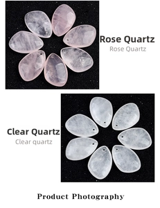 Macro detail of natural tear-drop rose and clear quartz pendants with polished texture