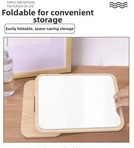 Close-up of minimalist wooden desktop makeup mirror showing foldable back support stand