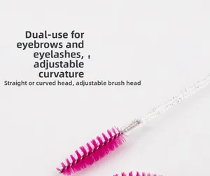 Close-up of pink disposable eyelash brush with adjustable head and glitter crystal handle