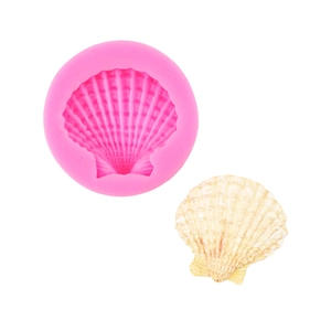 Detail view of pink silicone seashell mold with a realistic textured shell finish