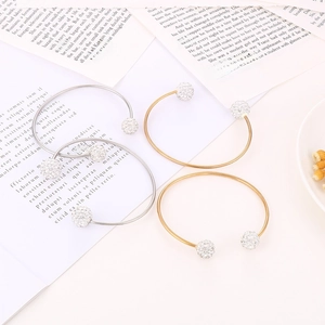 Minimalist C-shaped titanium steel bracelets in gold and silver with sparkling crystal balls