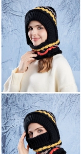 Winter knitted hood mask with ear flaps and fleece lining shown in snowy outdoor setting