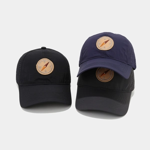 Quick-dry mesh baseball caps with compass embroidery and laser-cut breathable holes