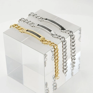 Men's 18K gold and silver stainless steel Cuban bracelets with black carbon fiber inlay