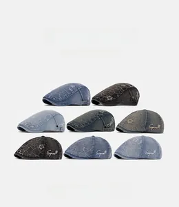 Detailed grid of vintage washed denim berets showing eight colors with side embroidery