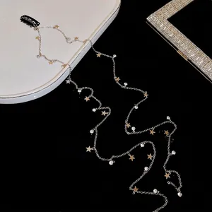 Pince à cheveux papillon élégante avec glands en perles et étoiles en cristal sur plateau