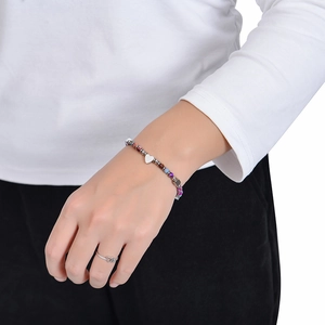Lapis lazuli beaded bracelet with heart pendant and matching ring on model wrist
