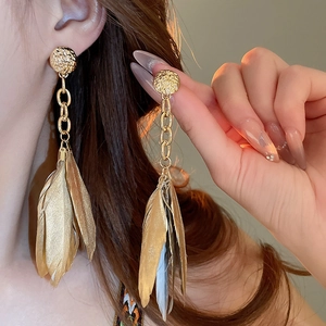 Bohemian gold long feather tassel earrings for women with vintage ethnic style design