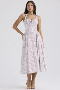 Detail of floral halter neck maxi dress featuring pleated bust and slim waist design