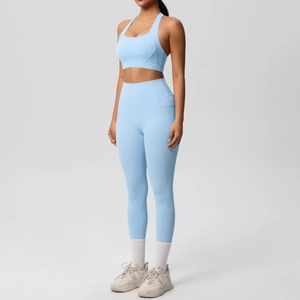 Detail view of light blue yoga set featuring a racerback top and leggings with side pockets