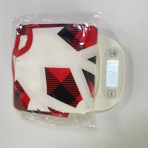 Christmas tree skirt weight measurement showing 121.7g on scale in packaging