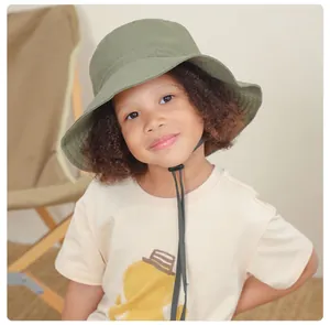 Detail of olive green kids sun hat with adjustable drawstring for outdoor protection