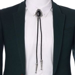 Classic Western bolo tie with black oval stone and silver floral carved metal base