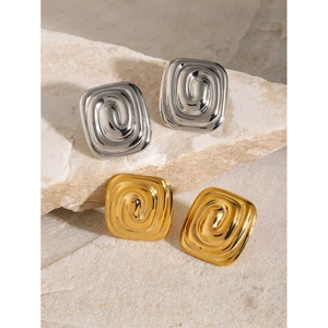 Square 18k gold and silver spiral textured stainless steel earrings on natural stone