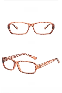 Detail view showing tortoise shell pattern and rectangular frame of the vintage glasses