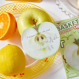 Creative apple slice shaped sticky notes from Fruit Basket series on a colorful ceramic plate