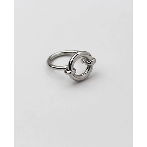 Minimalist silver geometric knot ring in polished brass finish on white background