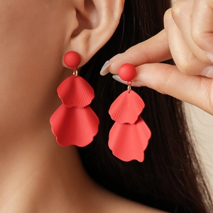 Chic red petal drop earrings with matte finish and silver needle for a unique vacation look