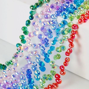 Colorful faceted crystal glass strawberry beads in various shades for DIY jewelry making