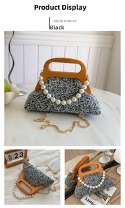Detail of tweed evening bag with vintage wooden handle and elegant pearl decoration