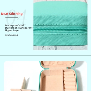 Detail of neat stitching and waterproof PU texture on mint green portable jewelry box