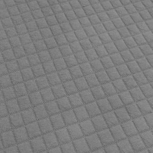 Macro shot of gray waffle knit fabric texture showing premium grid weaving pattern