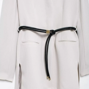 Women's light grey V-neck professional blazer with a black leather belt and gold buckle