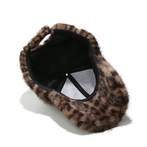 Detailed interior view of leopard print faux fur baseball cap showing inner lining and stitching