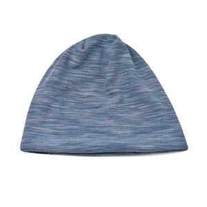 Detailed view of the blue mélange knit texture and soft fabric of the beanie hat