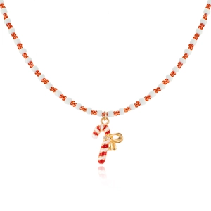 Detail of beaded Christmas necklace featuring a candy cane pendant with a golden bow
