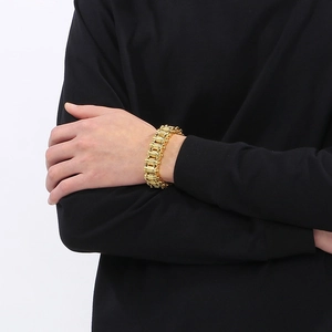 Men's hip hop gold mechanical chain bracelet with embossed texture on black sleeve