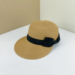 Women's woven straw sun hat in khaki with a decorative black ribbon bow accent