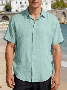 Detail of light green short sleeve shirt with breathable linen texture for men