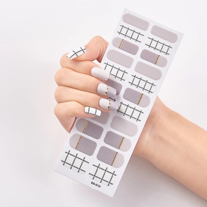 Detail of self-adhesive nail stickers in grey and white with gold lines, model SS-010
