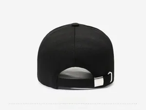 Detail of the back of a black textured fabric baseball cap with adjustable metal buckle
