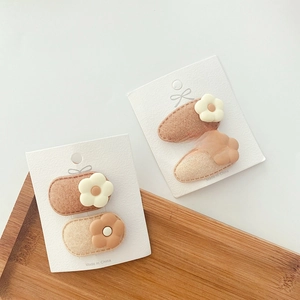 Sweet floral children BB clips in cream and milk tea tones with soft fabric finish