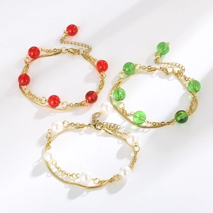 Double-layered gold titanium steel bracelets with red, green, and pearl beads