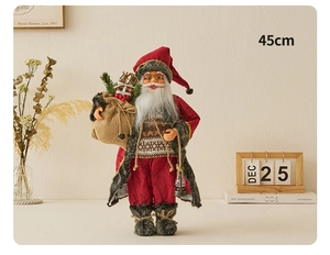 Standing 45cm Santa Claus figurine with red fabric coat and lantern in a cozy room